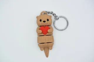 Knitted Flexi Otter With Heart photo 2