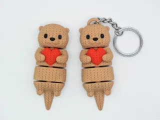 Knitted Flexi Otter With Heart photo 3
