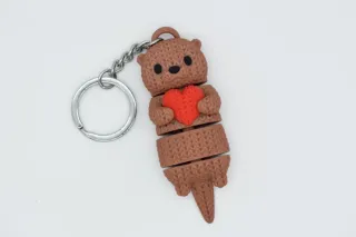 Knitted Flexi Otter With Heart photo 4