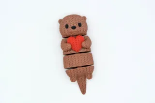 Knitted Flexi Otter With Heart photo 5